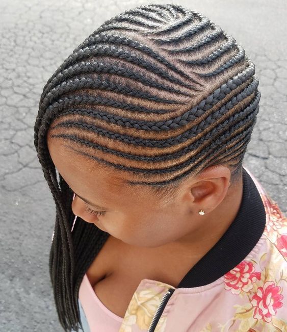 Female with cornrow braids with side swept
