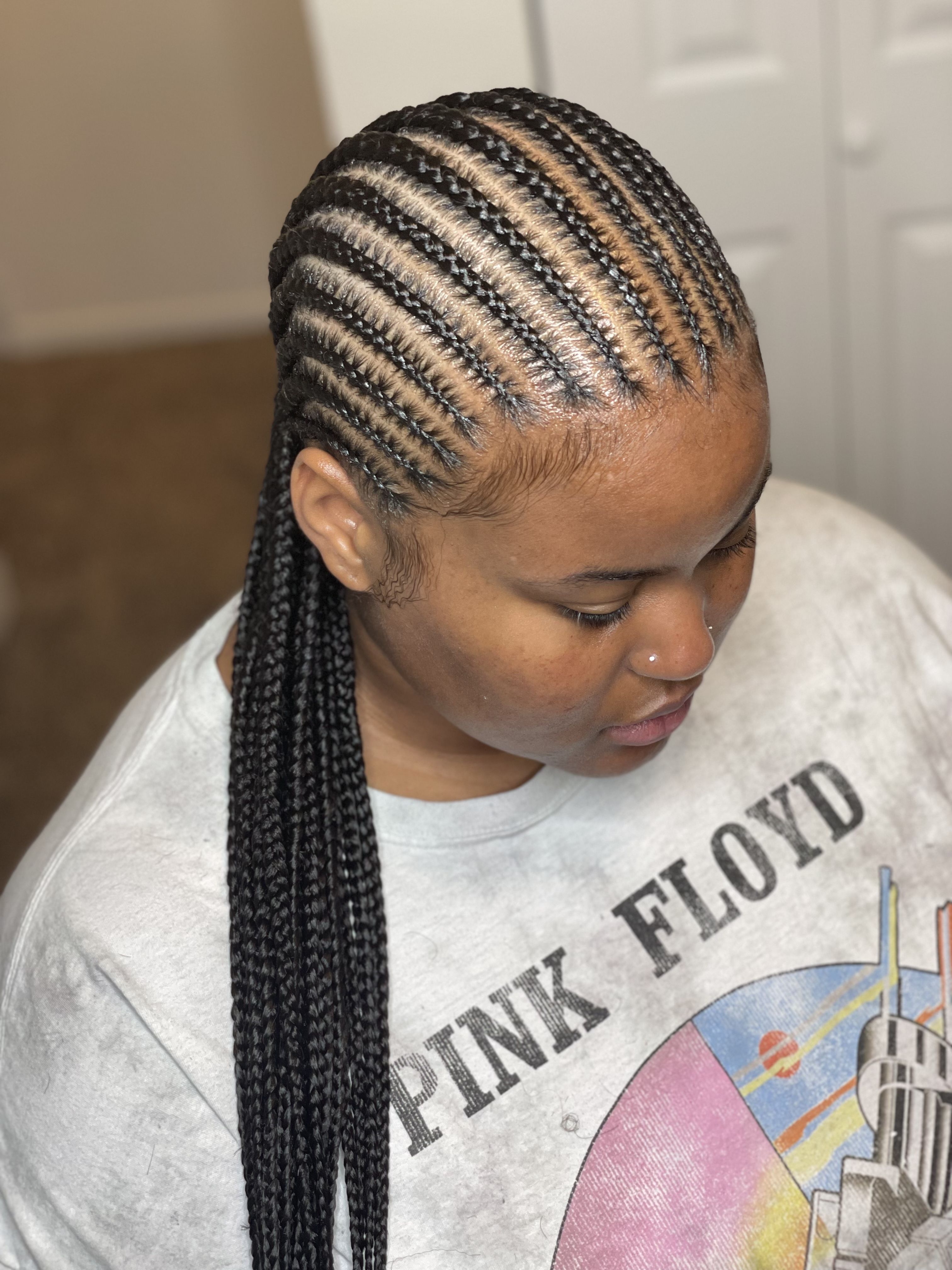 Female with straight back braids