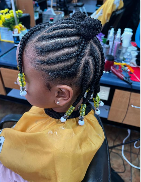 Little girl with Natural Hair Braids With Beads