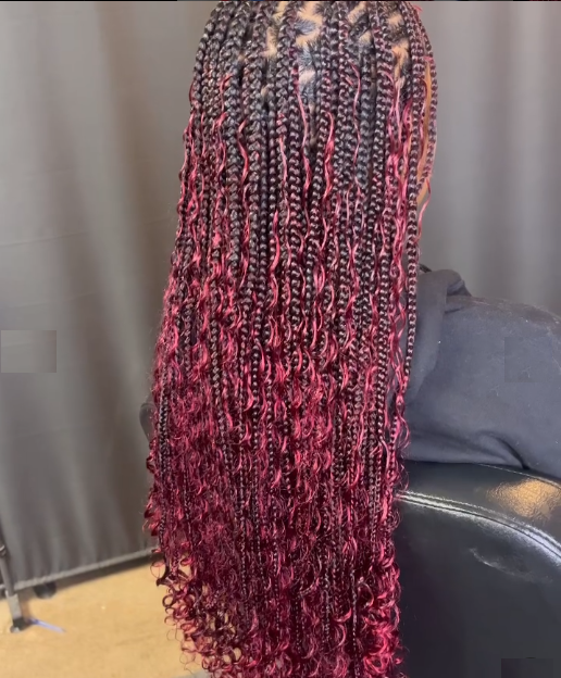 Burgundy goddesss braids shown from back