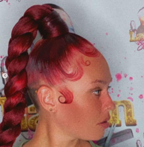 Girl with Red Braided Ponytail